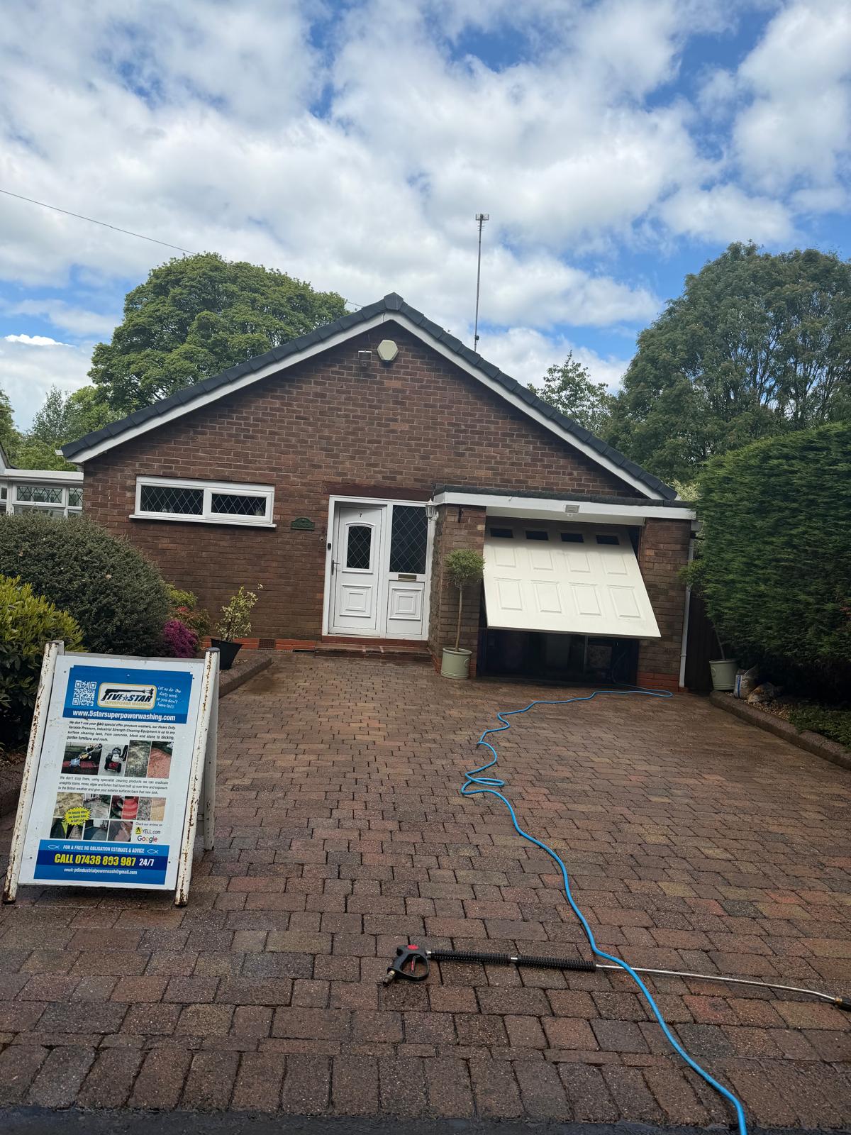 Block paving driveway during pressure washing - 5 Star A-board sign and equipment on site
