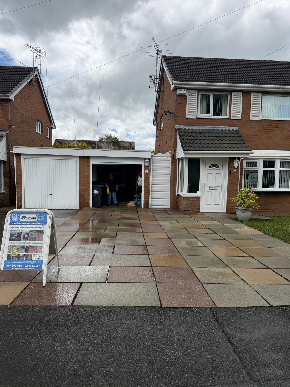 Flagstone driveway after cleaning - slabs restored to original colour